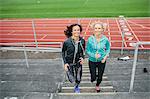 Women running on stadium