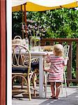 Girl standing in patio