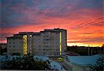 Apartment buildings at sunset