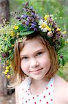 Portrait of a girl with a wreath of flowers in her hair, Sweden.