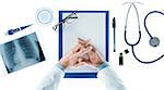 Doctor with hands clasped waiting at desk on white background, top view, healthcare and prevention concept
