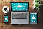 Cloud computing and social network interface on a laptop, tablet and smartphone screen