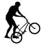 Silhouette of a cyclist male performing acrobatic pirouettes. vector illustration.