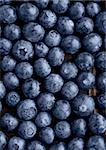 Blueberries on grunge wooden kitchen board. Natural healthy food. Still life photography