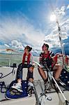 Man and woman sitting in sailing boat