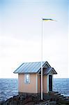 Wooden house at coastline