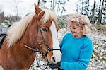 Senior woman with Icelandic horse