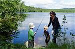 Mother with sons fishing