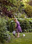 Girl with bag net in garden