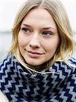 Portrait of young woman wearing muffler