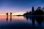 People long-distance skating at evening, Vanern, Sweden