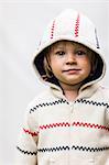 Portrait of girl wearing hoodie, studio shot