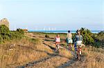 Mother with daughters cycling, Oland, Sweden