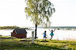 Girls playing at lake