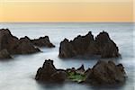 Sea stacks of the coastal rock formations at sunset in the Tyrrhenian Sea at San Felice Circeoin the Province of Latina in Lazio, Italy