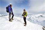 Mountaineers on top of snow-covered mountain, Saas Fee, Switzerland