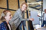 Portrait smiling businesswoman in conference room meeting