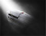 3D render of skeleton emerging from a coffin