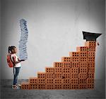 Child with backpack and study books climbs a bricks scale