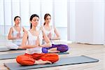 Beautiful women practicing yoga