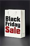 An image of a white shopping bag black friday sale