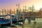 Gondolas and basilica Santa Maria della Salute in Venice, Italy