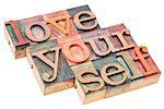 love yourself - self esteem concept - isolated text in vintage letterpress wood type printing blocks