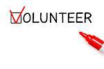 Check mark with red marker on tick box in Volunteer form with copy space.