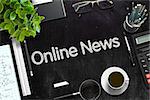 Online News Handwritten on Black Chalkboard. Top View Composition with Black Chalkboard with Office Supplies Around. 3d Rendering. Toned Illustration.