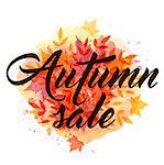 Abstract autumn background with yellow and red falling leaves. "Autumn sale" lettering and orange watercolor blots.