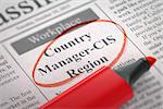 A Newspaper Column in the Classifieds with the Small Ads of Job Search of Country Manager-CIS Region, Circled with a Red Highlighter. Blurred Image with Selective focus. Concept of Recruitment. 3D.