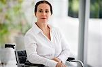 Portrait of senior woman in a wheelchair.