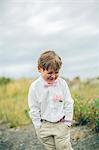 Sweden, Blekinge, Karlskrona, Aspo, Well dressed boy (6-7) smiling