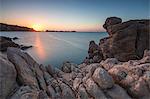 White cliffs and blue sea framed by the lights of sunset Santa Teresa di Gallura, Province of Sassari, Sardinia, Italy, Mediterranean, Europe