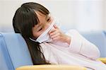 Sick young Japanese girl at the hospital