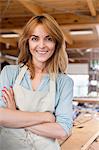 Portrait smiling artist in studio