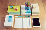 Perfectly tidy school student stationery on wooden surface.
