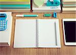 Perfectly tidy school student stationery on wooden surface.