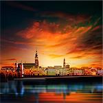 abstract sunset background with panorama of Heidelberg and red clouds