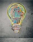 Lightbulb drawn and colored with business sketches