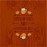 Hand-sketched typographic element with pumpkins, hearts, pumpkin spice latte and text on wooden background. Pumpkin spice and everything nice