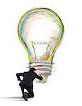 Businessman draws on the wall a big colored bulb with bright colors