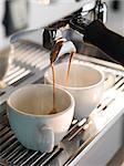 Espresso being made with a professional coffee machine.