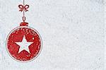 christmas card or new year background made of decorative ball symbol handwritten on snow and red craft paper