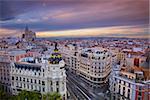 Cityscape image of Madrid, Spain during sunset.