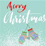 Merry Christmas. Modern calligraphy for Christmas cards and posters. Vector lettering with cute mitten pair. EPS10