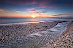 The lights of sunrise reflected in the calm sea, Porto Recanati, Province of Macerata, Conero Riviera, Marche, Italy, Europe