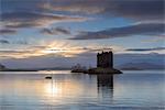 Mid-winter sunset over Loch Linnhe and Castle Stalker in winter, Argyll and Bute, Scotland, United Kingdom, Europe