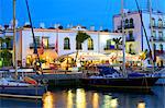 Restaurants in Puerto de Morgan at dusk, Gran Canaria, Canary Islands, Spain, Atlantic Ocean, Europe