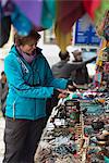 Shopping for souvenirs in Namche Bazaar, the main town during the Everest base camp trek, Khumbu Region, Nepal, Asia